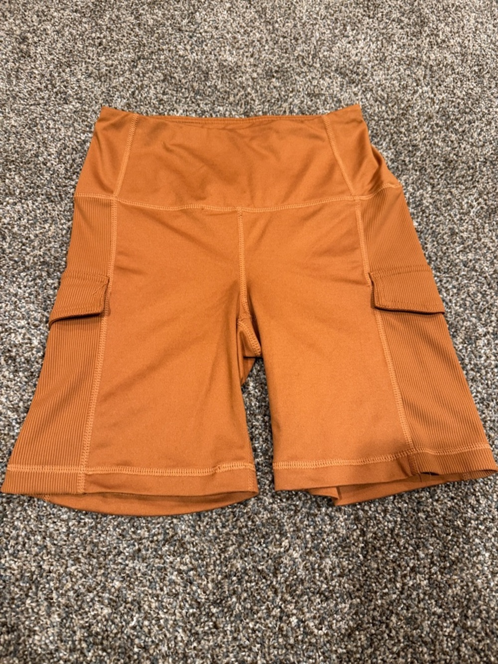 Velocity Women's Cargo Bike Shorts in Rust Orange size Small 7” inseam
